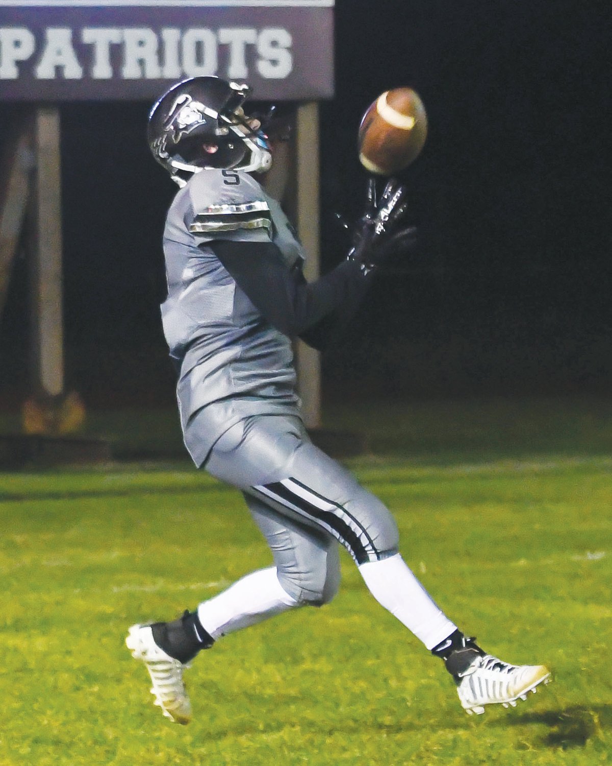 HAULING IT IN: Brandon Whitman makes a play downfield.